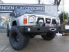 F4x4 Első csörlőtartós acél lökhárító lámpa kivágással + leszerelhető gallytörő rács Nissan Patrol Y60